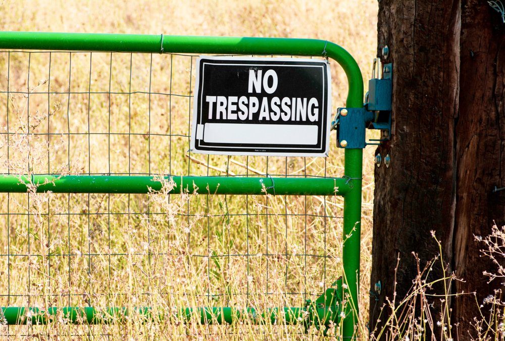 “No Trespassing” signs aren’t required on farmland, but they are recommended so there’s no ambiguity.