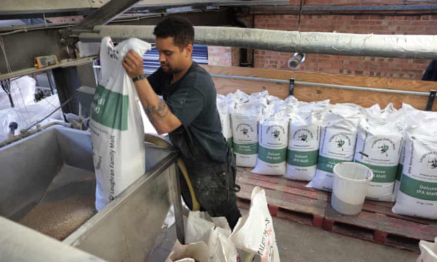Sacks of malt emptied into the mix at Gipsy Hill Brewery in south London.