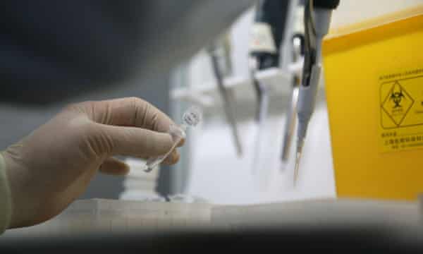 Test tube being filled at a laboratory