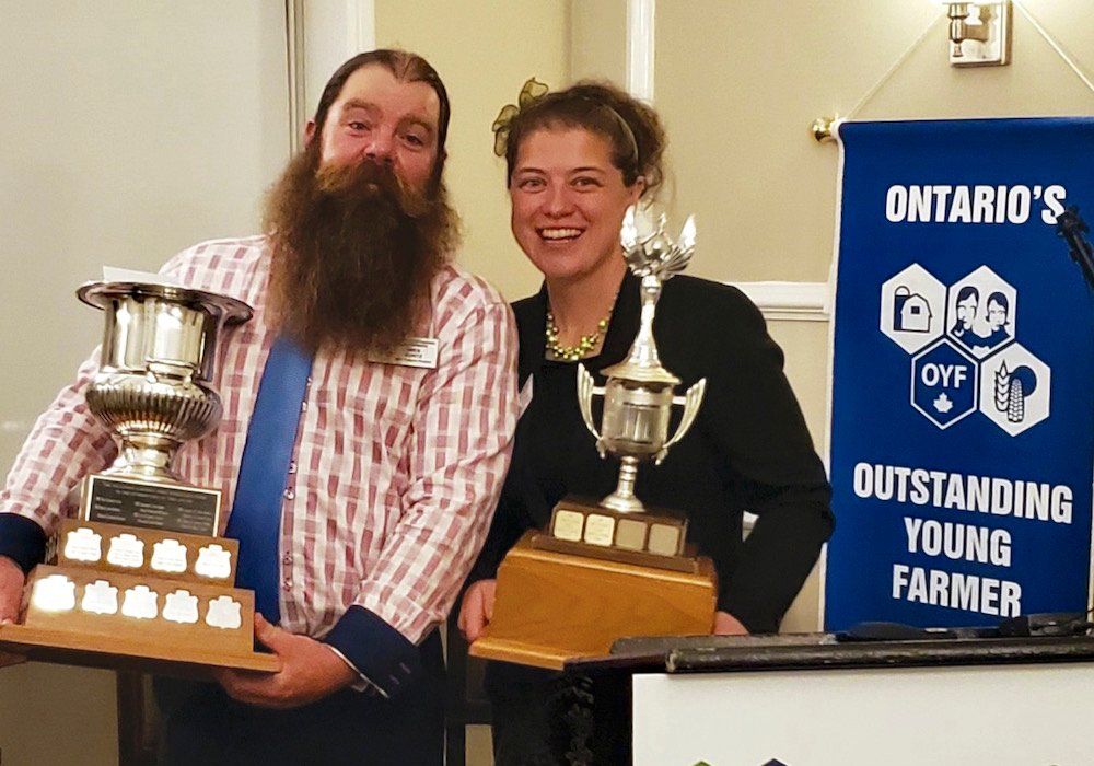 Wes Kuntz and Jenny Butcher just after they accepted their trophies as Ontario’s Outstanding Young Farmers.