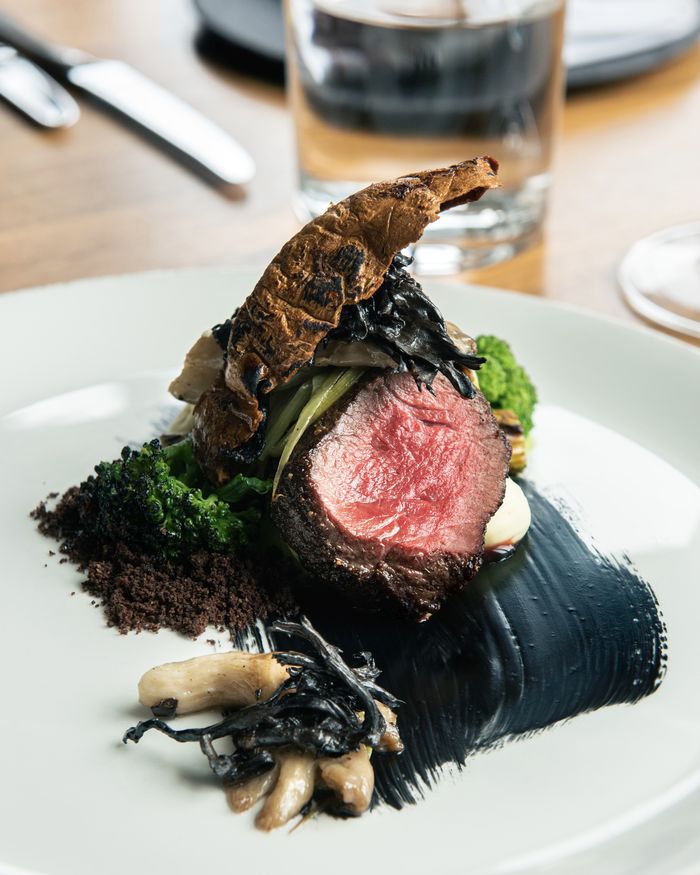 Kootenay-raised bison striploin with coffee soil and forest fire butter