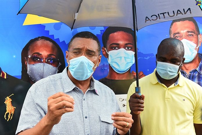 Prime minister Holness promoting vaccination