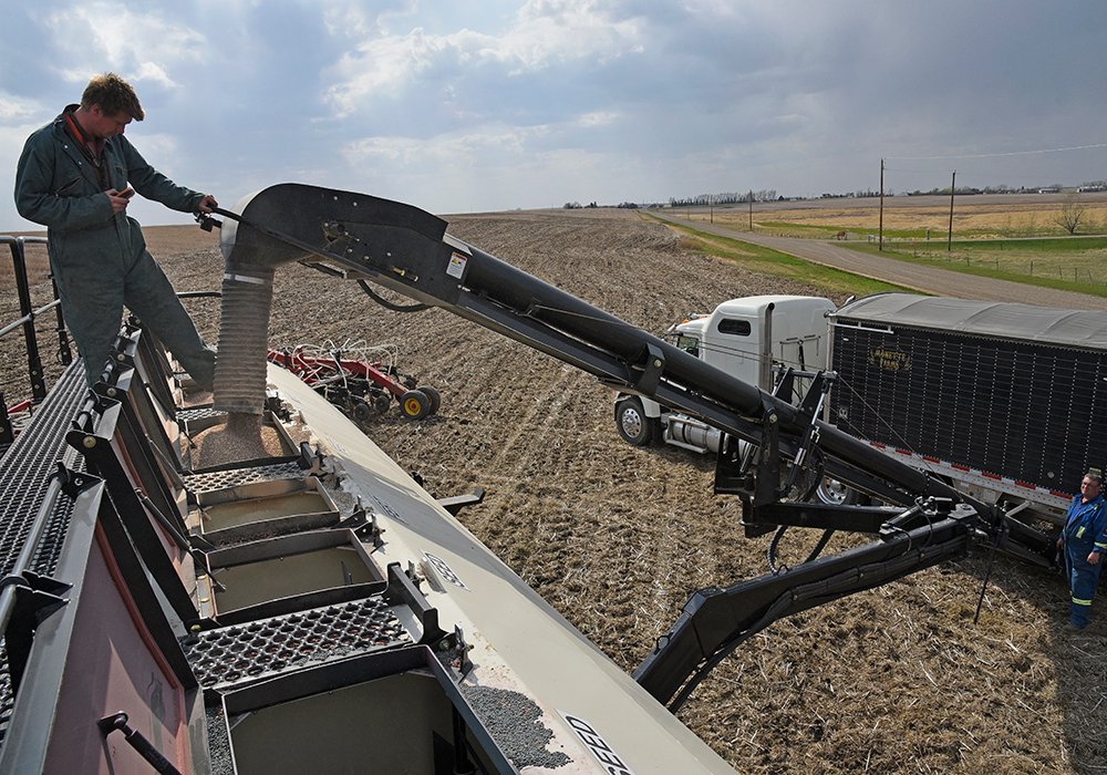 Farmers apply nitrogen to boost yields of corn, canola and wheat, and higher fertilizer costs could translate into higher meat and bread prices. 