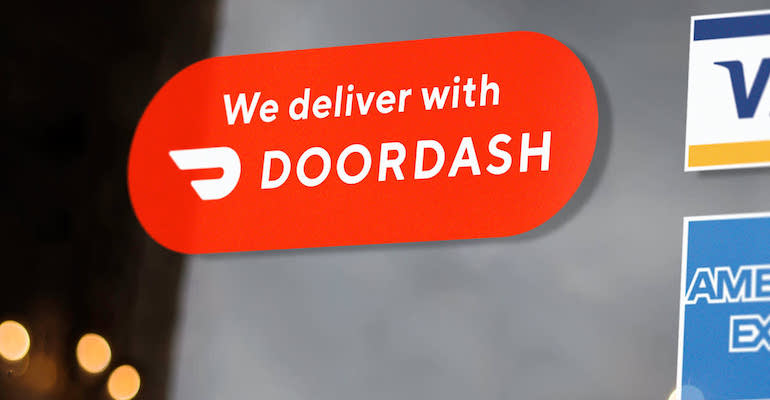 DoorDash delivery-retailer window sign.jpg