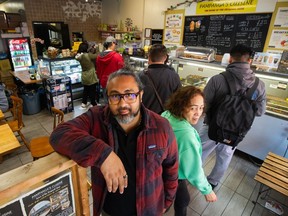 VANCOUVER, BC - June 21, 2023 - Customer RJ Aquino inside Pampanga's in Vancouver, BC., June 21, 2023. (Arlen Redekop / Postmedia staff photo) (Story by Dan Fumano) [PNG Merlin Archive]