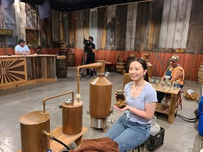 Richmond-based distiller Kristine Hui is pictured on the set of the Discovery reality TV show Moonshiners: Master Distiller.