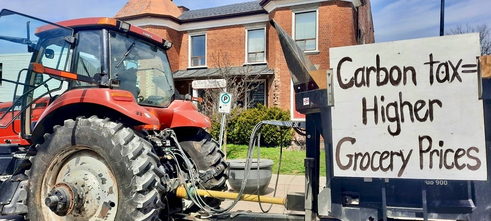 The tractor rally delivered a letter protesting the carbon tax and asking for support at three MP offices in the Whitby area, including MP Mark Holland’s office, shown here.