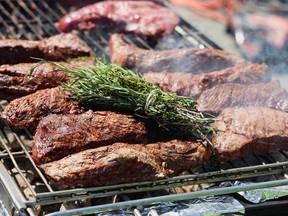 steaks on a grill