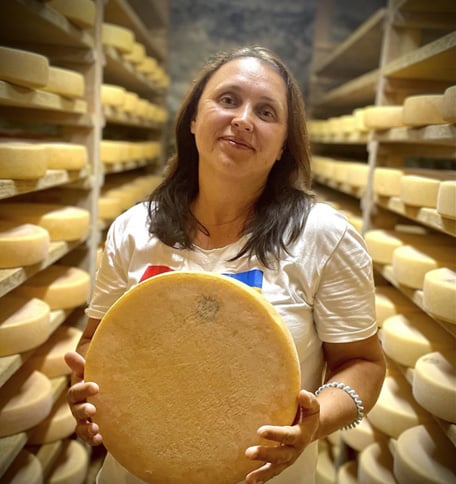 Polina Zhovtyak still produces cheese, runs her daughter’s bakery 
and keeps the farm she founded with her husband ticking over, 
while they both serve in the Ukrainian army. 