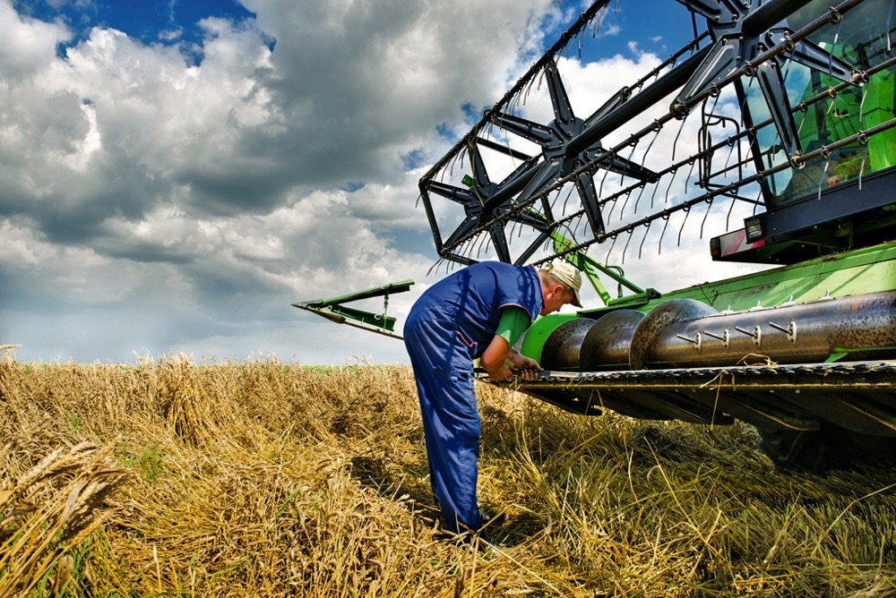 combine and farmer