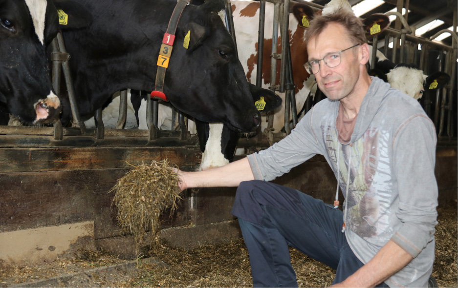 Han Langeler show the ration fed to his cattle at his farm near Aalten in the Netherlands.