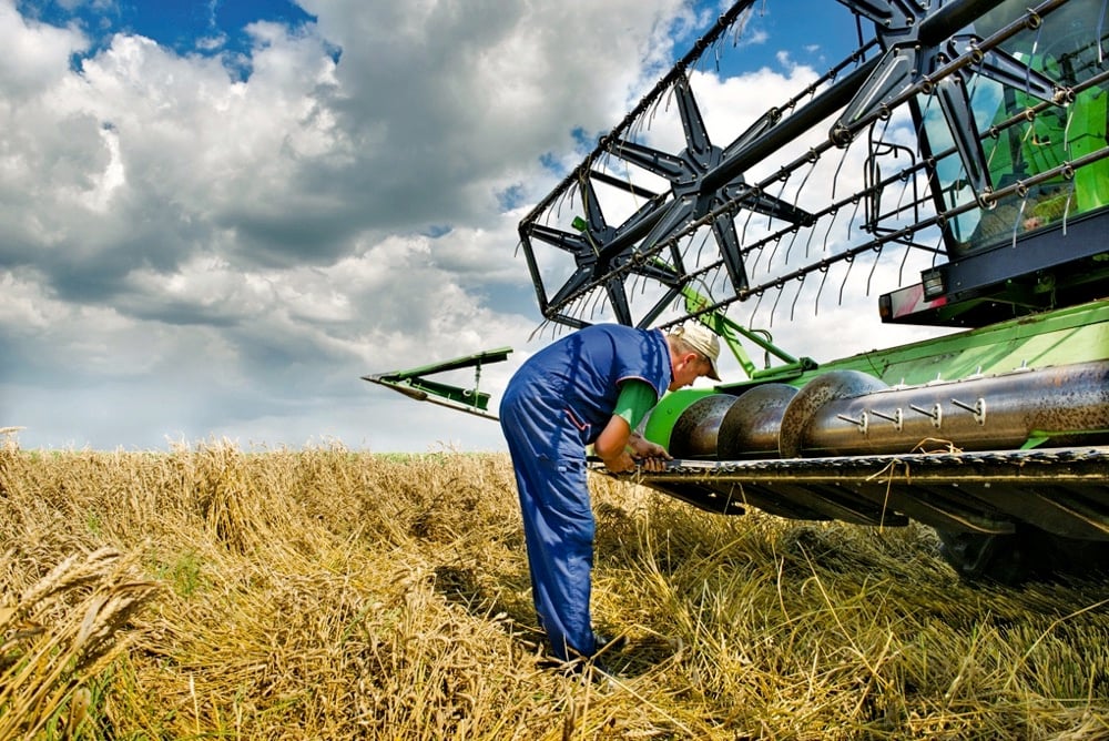 combine and farmer