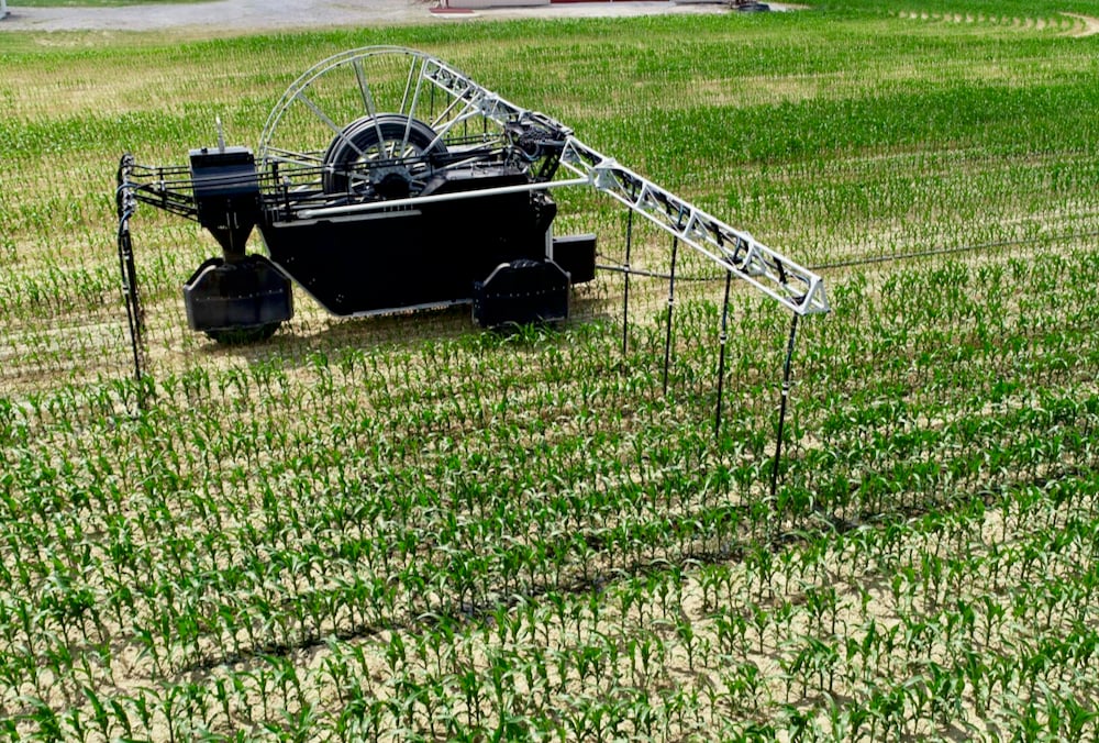 Rain 360© unit applies watery manure to a standing crop of corn.