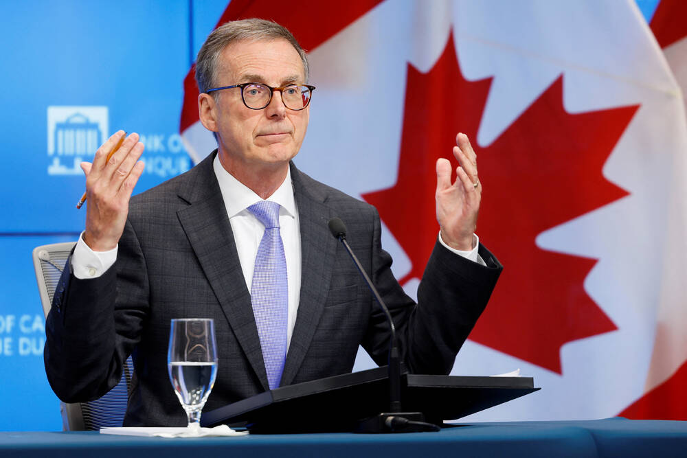 Bank of Canada cuts rates, sees weaker economy in 2024