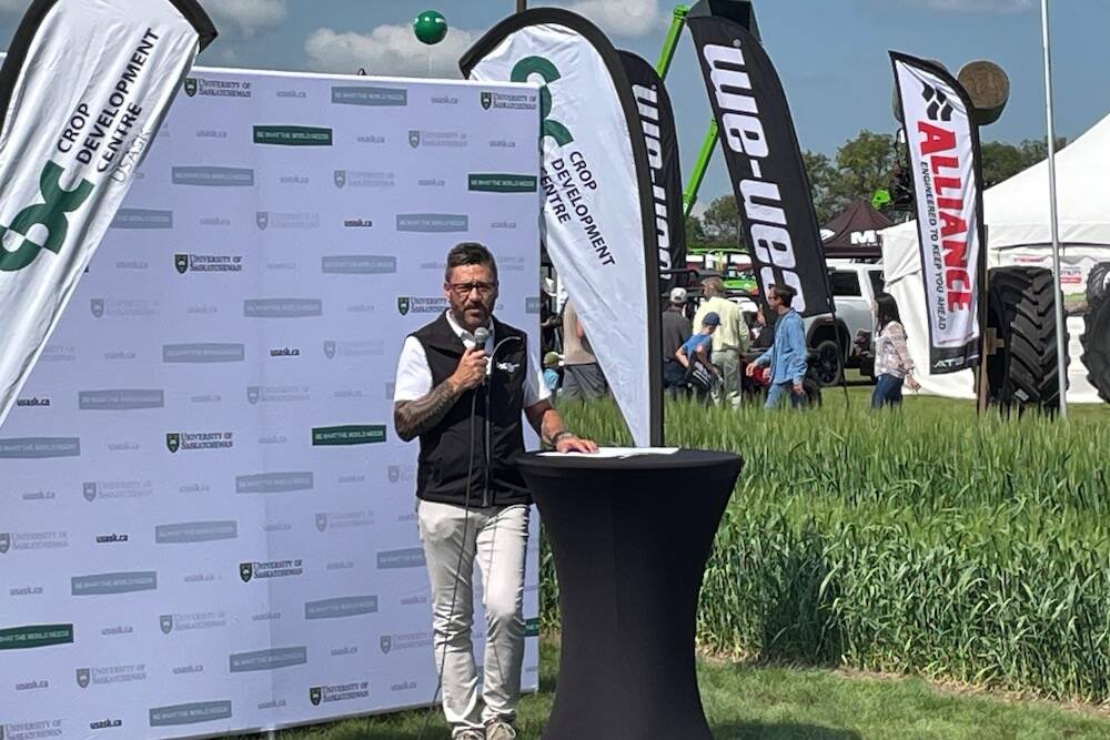 Dr. Curtis Pozniak, head of the Crop Development Centre, announces the EY report’s findings on July 16 at the University of Saskatchewan’s site at Ag in Motion.
