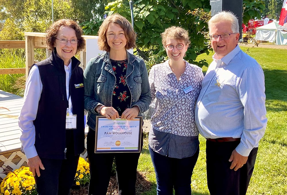 Pam Woodhouse, second from right, was awarded AgScape's Teaching Excellence in Agriculture and Food Education Award at Canada's Outdoor Farm Show Sept. 12, 2023. Woodhouse is flanked by Lillie Ann Morris, left, Glacier FarmMedia representative, Mira Lyonblum, AgScape executive director, and Senator Rob Black, far right.