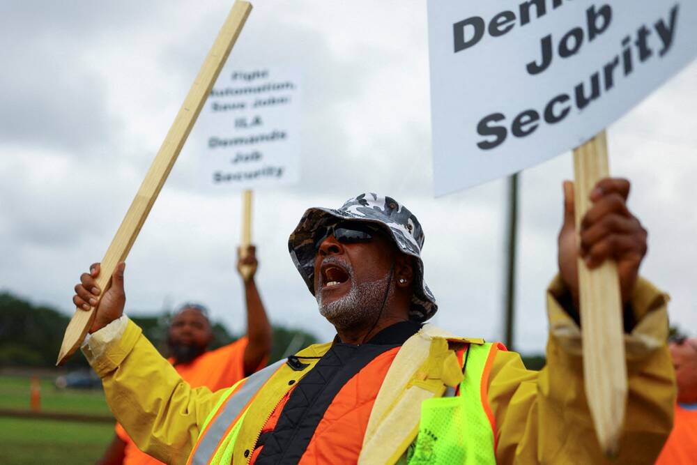 White House sides with union as US dockworker strike enters second day