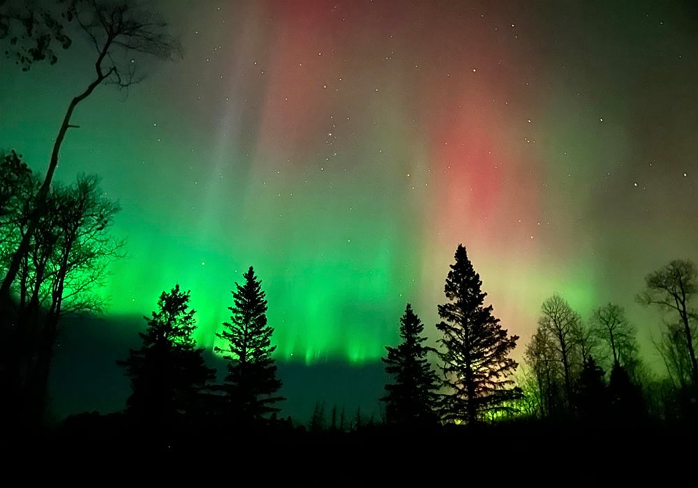 A recent solar flare seems not to have caused many issues for producers, but it has generated some spectacular photos of the aurora borealis by sky watchers. This image was taken Sunday night, October 6, 2024 near Turtle Lake, Sask. Photo: Facebook/Darren Schoonbaert
