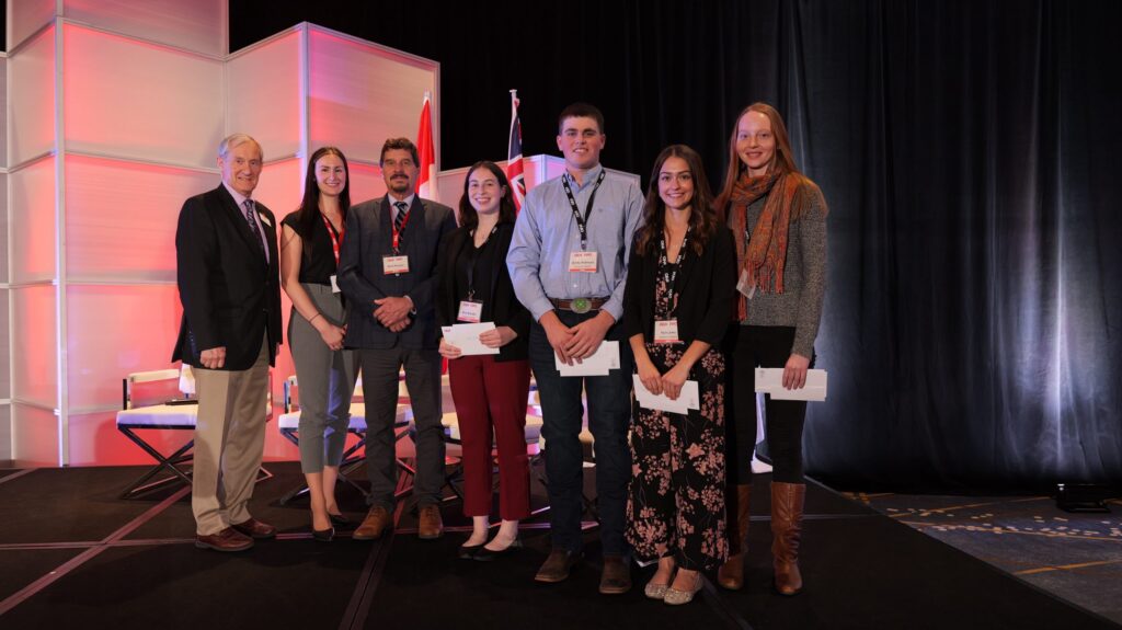 Pictured from left to right: Zone 6 Director Crispin Colvin, Zone 14 Director Vanessa Renaud, Zone 9 Director Mark Reusser, Mary Brander, Bobby Robinson, Kyla Lewis, and Alaina MacDonald at the OFA annual general meeting in Toronto on Nov. 26, 2024. [Not pictured: Kaylee Wells].