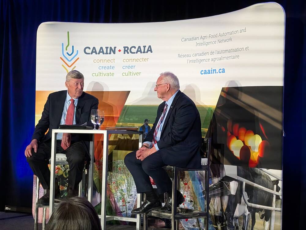 Kim McConnell speaks with John Weekes at an event hosted by CAAIN at the Westin hotel, Ottawa, Feb. 11. Photo: Jonah Grignon
