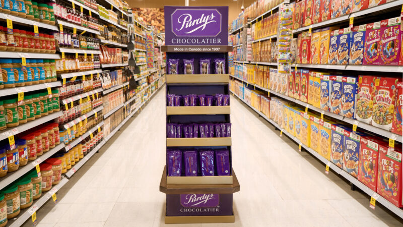 Purdys Chocolatier says the buy Canadian movement has generated so much demand for its products that it decided to sell them outside its own stores for the first time in its 118-year-old history. A Purdys display is seen in a grocery store in this undated handout image. THE CANADIAN PRESS/Handout - Purdys Chocolatier