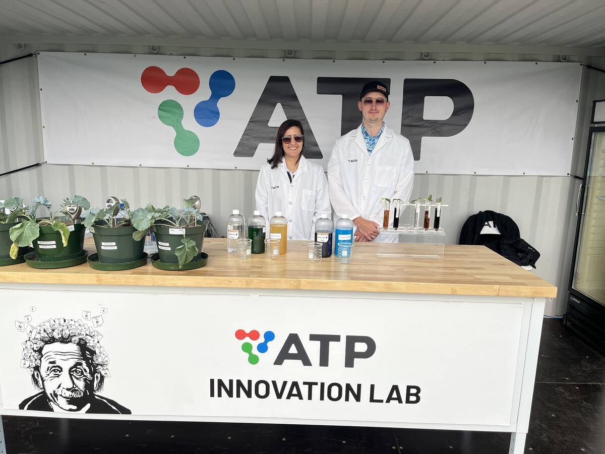 Barbara Hodecker, director of research and development for ATP Nutrition, and Aron Kathler, regional account manager for Western Manitoba and South Eastern Saskatchewan, are all smiles after ATP won the 2025 Ag in Motion Innovation in Agriculture Award for 2025 