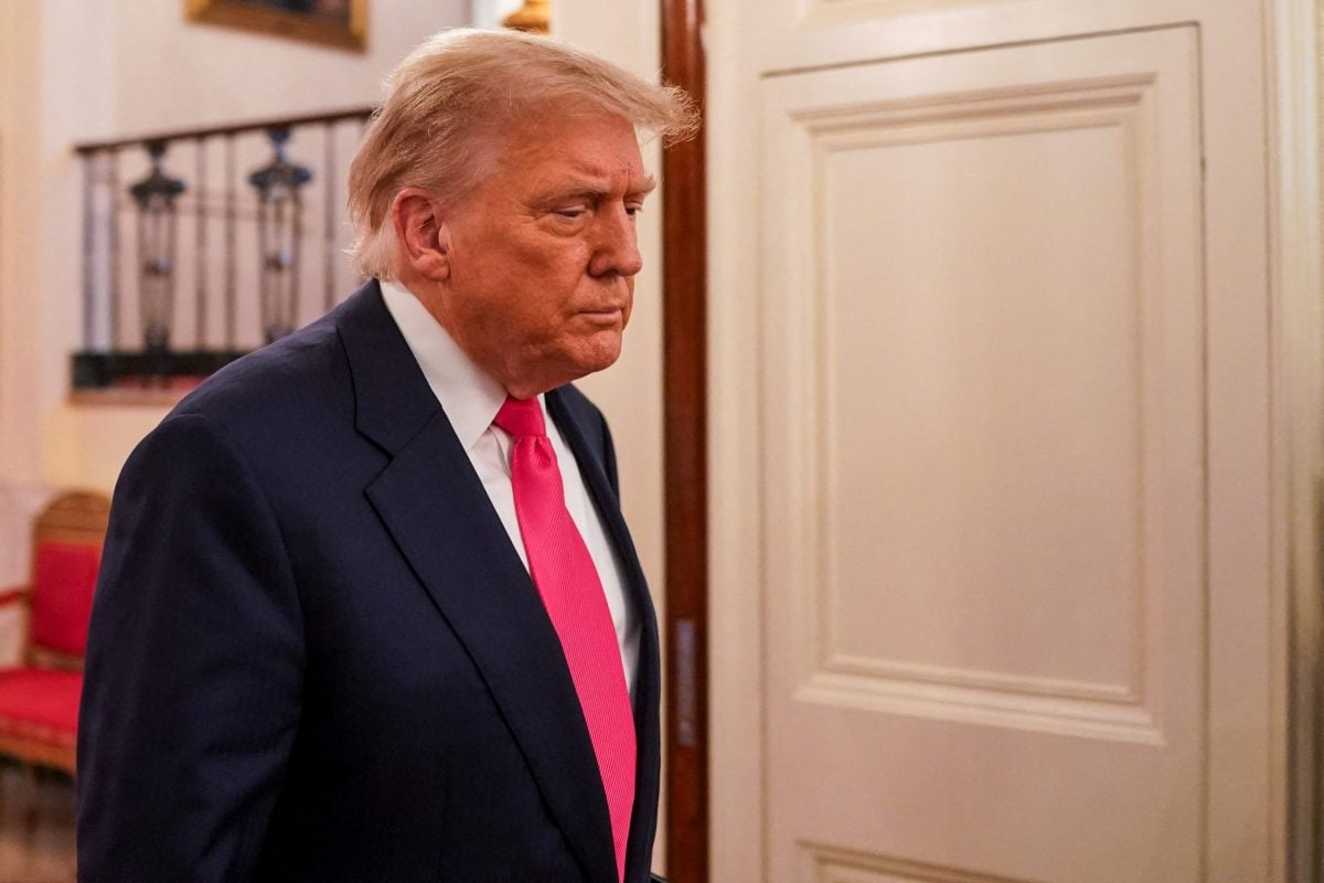FILE PHOTO: U.S. President Donald Trump walks on the day of a “One Big Beautiful” event at the White House in Washington, DC., U.S., June 26, 2025. REUTERS/Nathan Howard/File Photo
