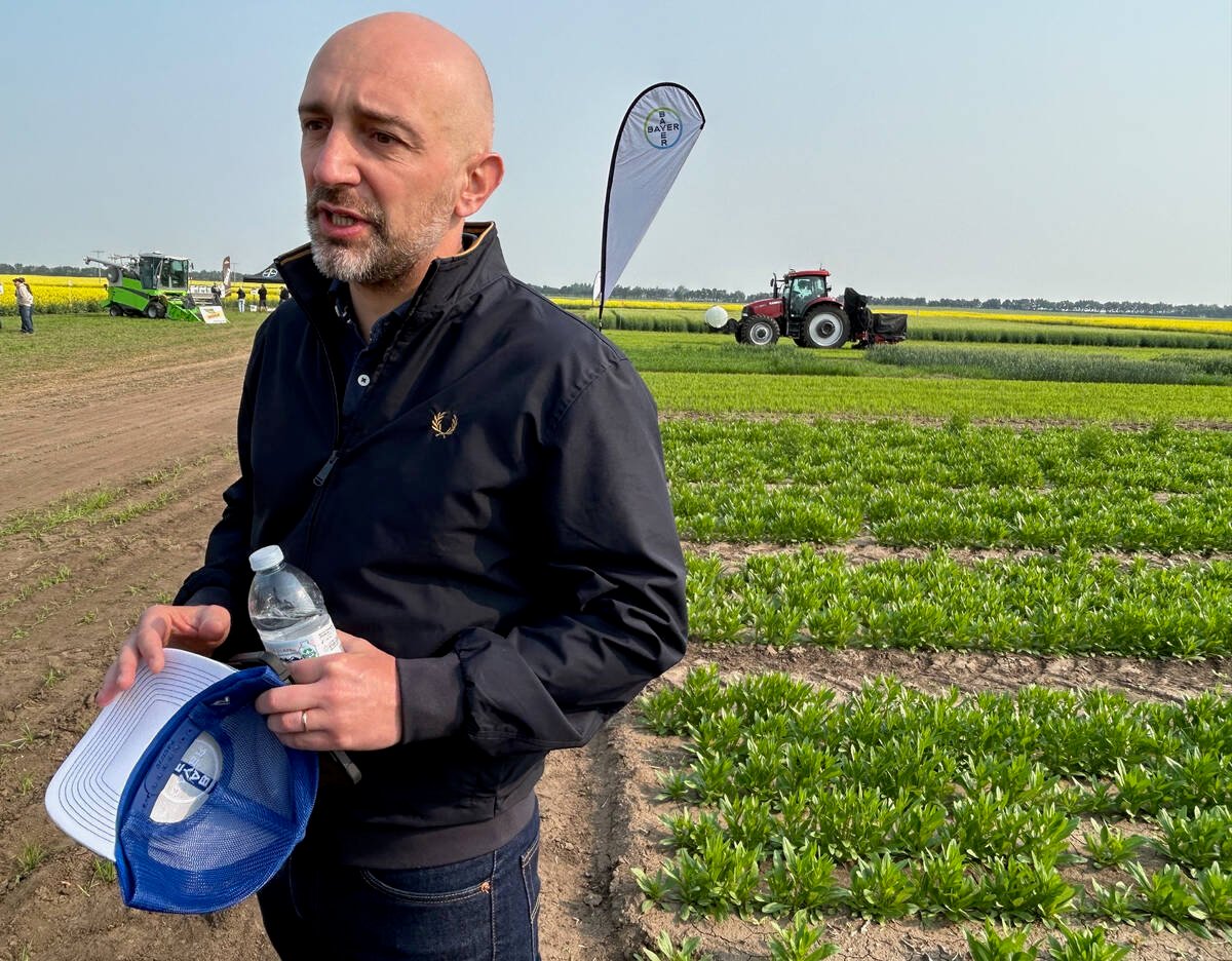 Antoine Bernet, country division head with Bayer Crop Science in Canada, believes that oilseed crops grown in Canada speaks at the Bayer research farm near Saskatoon July 16.