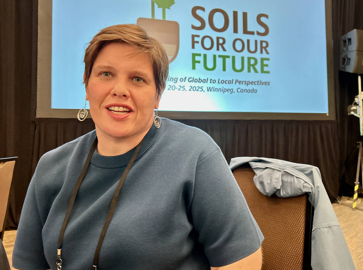 Sabrina Peric, a University of Calgary professor, is photographed in front of a 