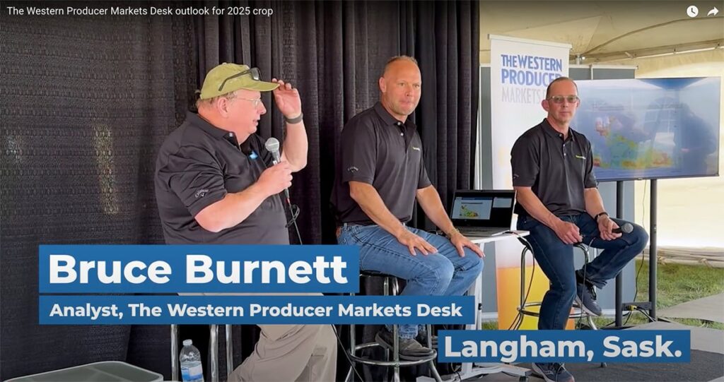 Bruce Burnett, left, Jerry Klassen and Ranulf Glanville talk markets at the Ag in Motion farm show near Langham, Sask.
