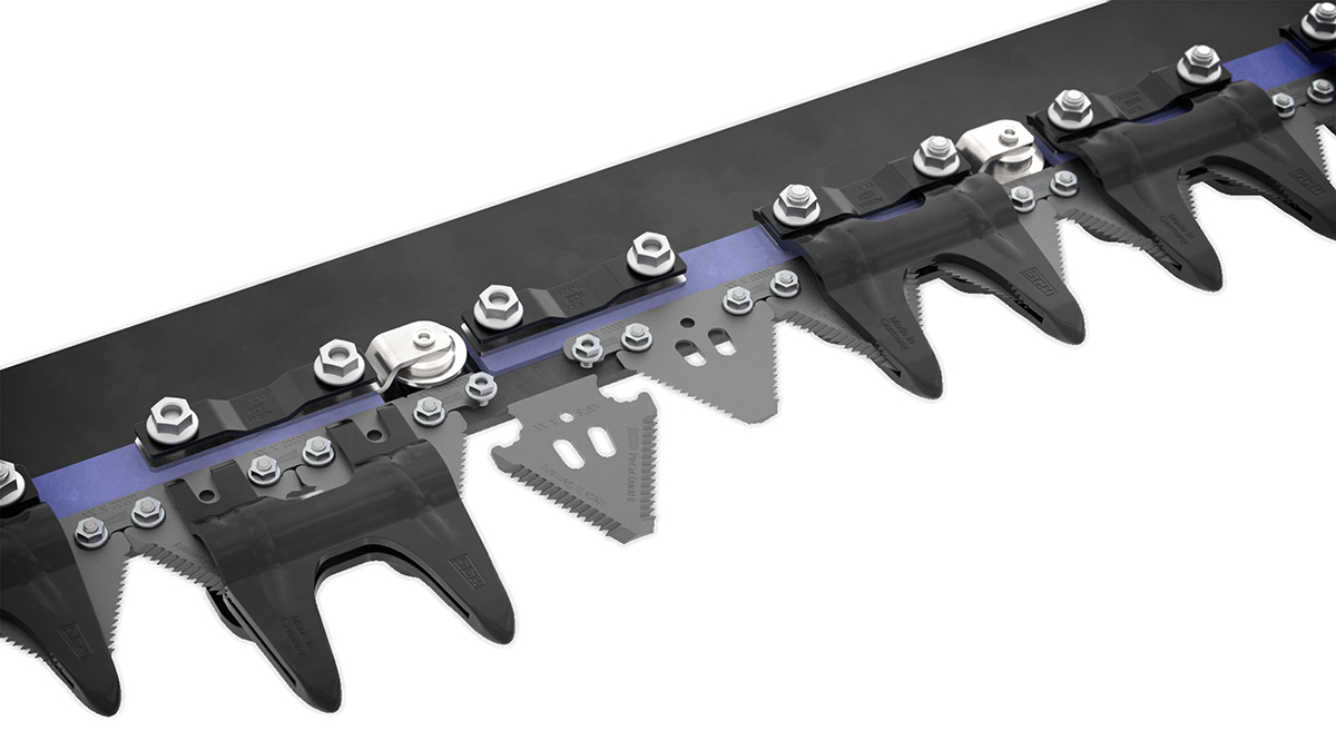An image showing the triangular knife blades on a cutter bar.