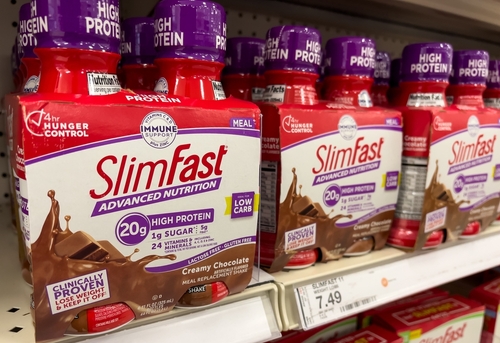 SlimFast products displayed on shelves, now sold by Glanbia to Heartland Food Products Group.