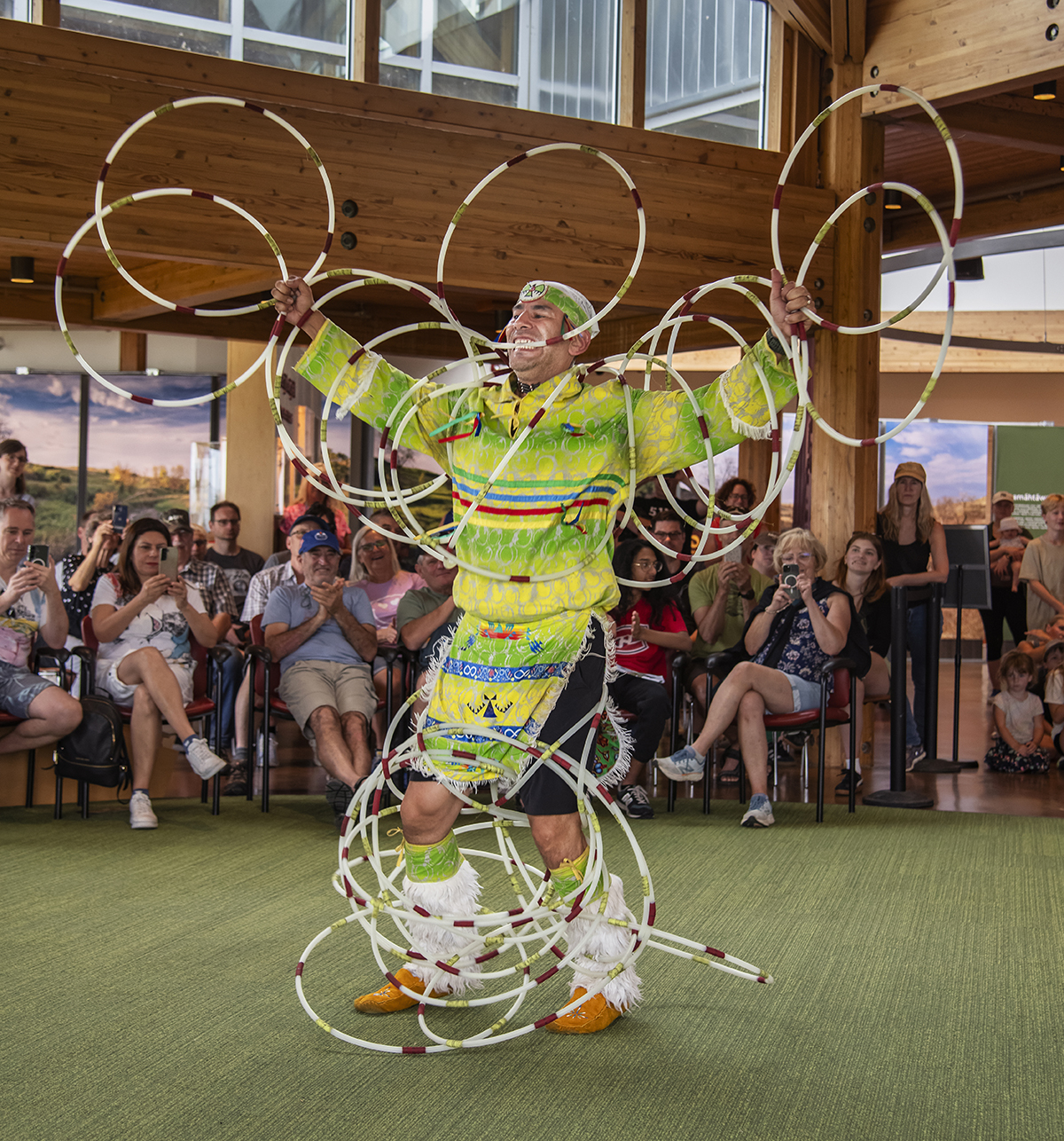 Hoop dancer Lawrence Roy dancing with 30 rings at Waunuskewin Heritage Park.
