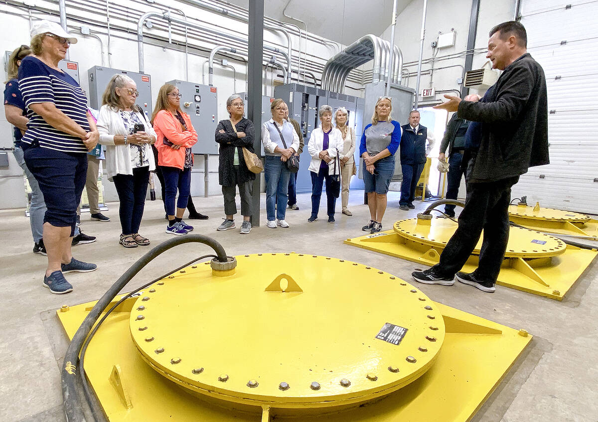 Frank Jonkman, Town of Bradford West Gwillimbury (BWG) drainage superintendent, explains how the four pumps at the Art Janse Pumping Station provide approximately 95 per cent of the Marsh’s pumping capacity and can displace an inch-and-a-half of water off the 7,000 acres in approximately 24 hours during a Sept. 20 tour. Photo: Diana Martin