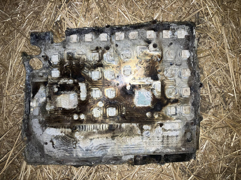 What looks like a burnt up cicuit board is actually space debris found near Hodgeville, Saskatchewan, in July 2024.