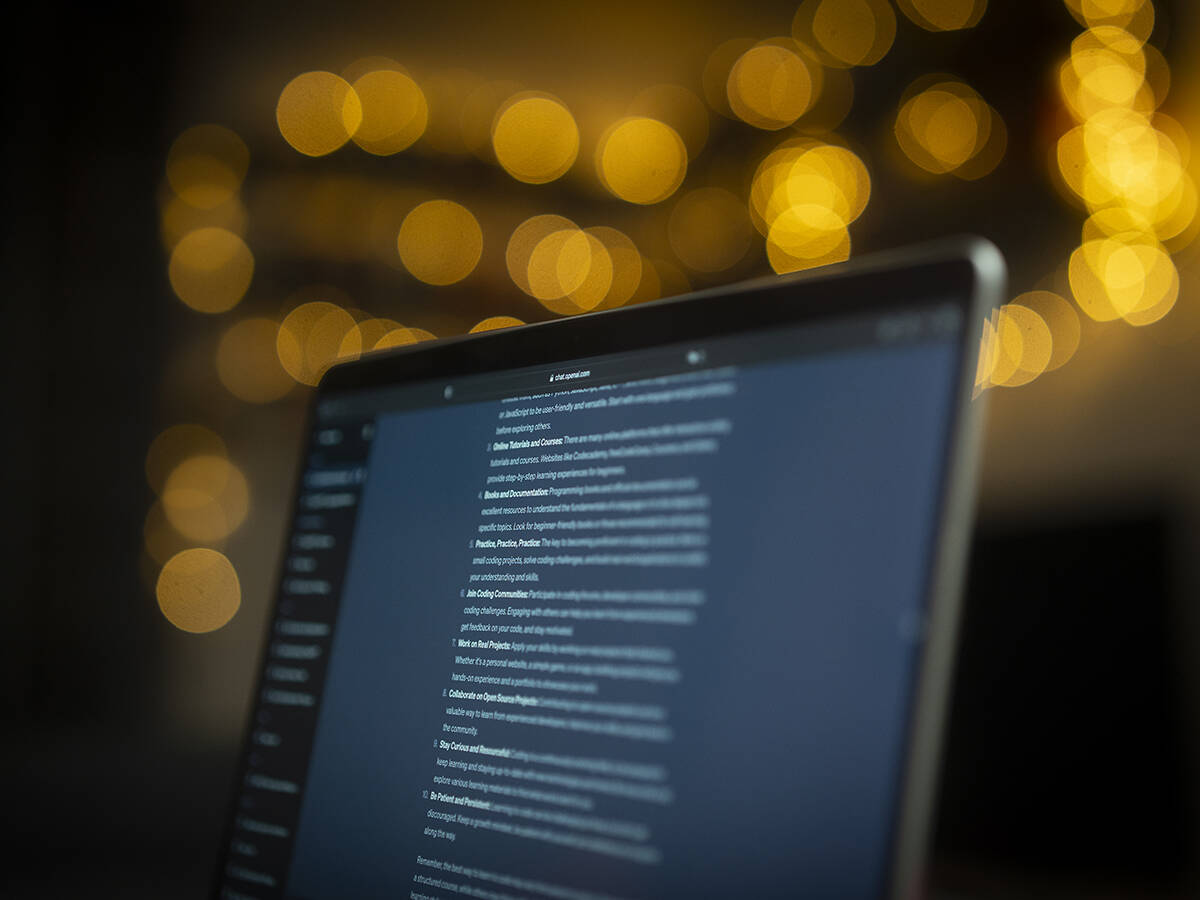 A laptop screen is seen with the OpenAI ChatGPT website active in this photo illustration.