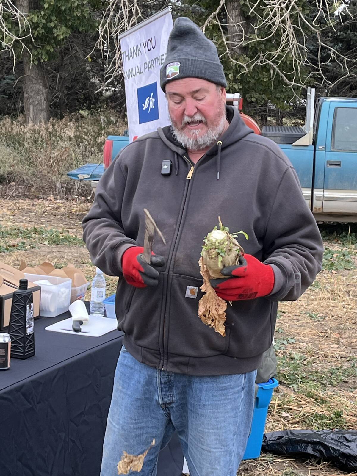 Alberta Sugar Beet Growers president Gary Tokariuk holds a sugar beet pulled from his farm during a field tour in mid-October.
