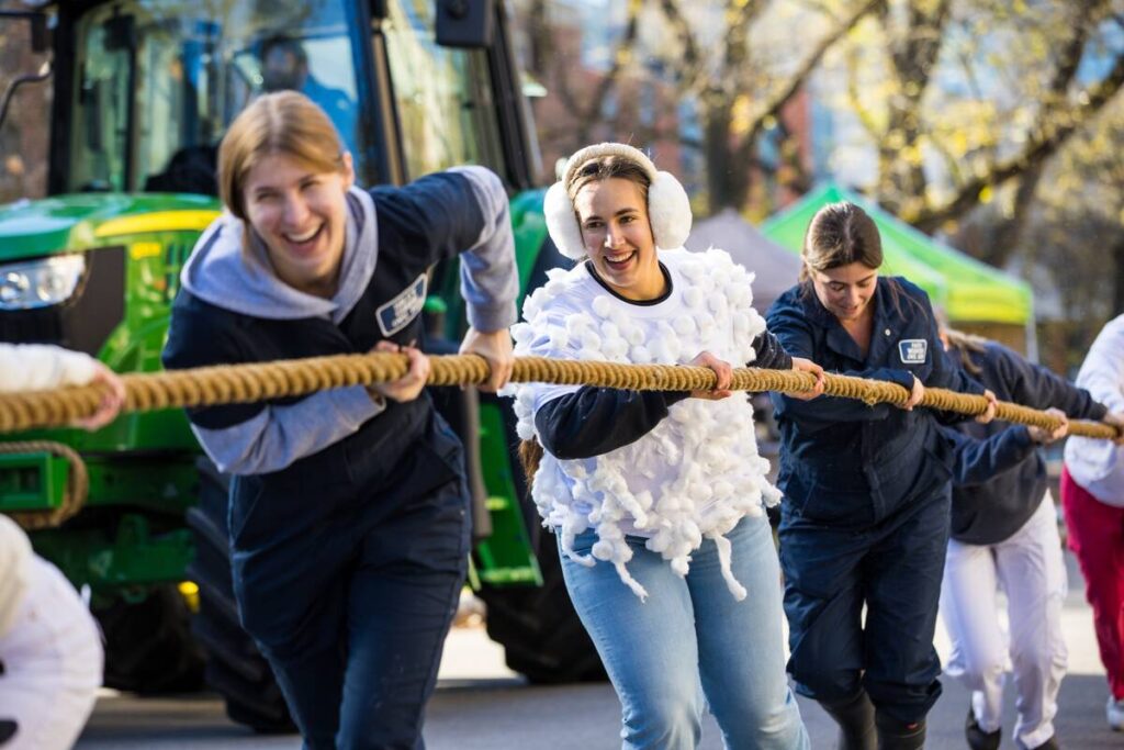 A team from the Ontario Veterinary College competing in Tractor Tug for Tots October 2025.