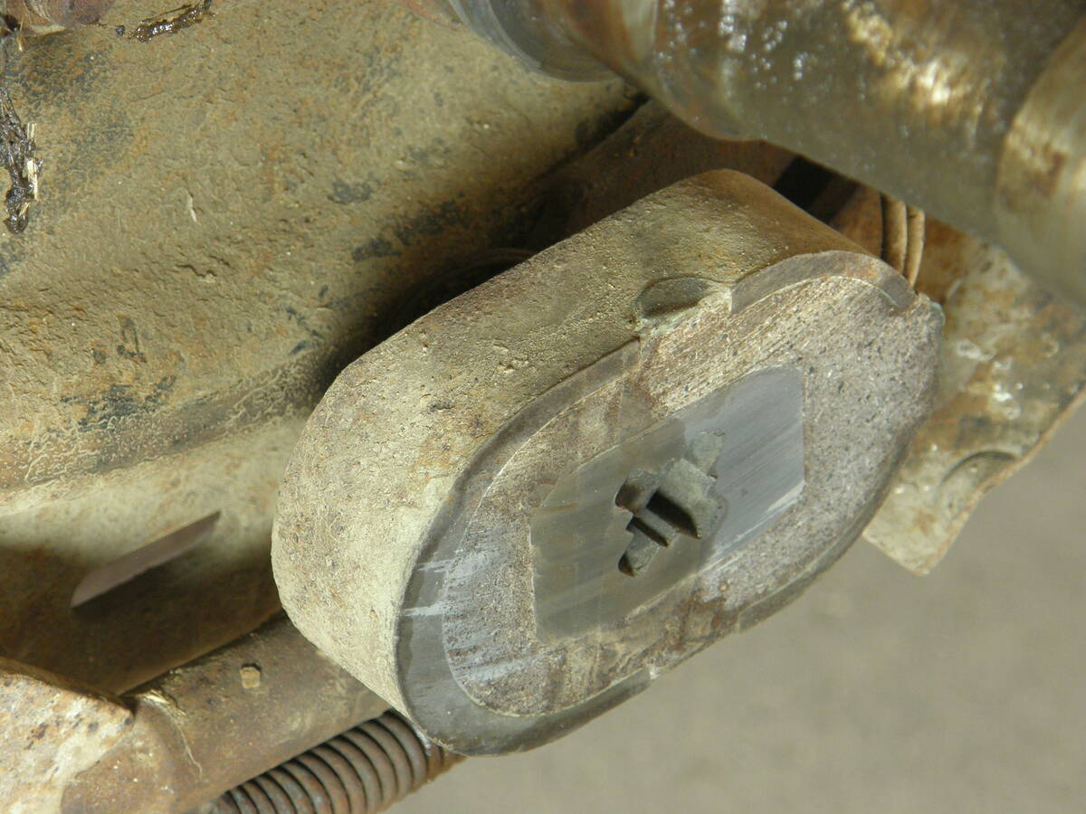 Close-up of a worn magnet in a wheel hub.