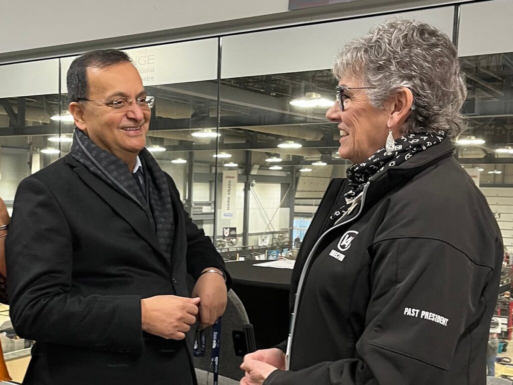 Dinesh Patnaik, Indian high commissioner to Canada, chats with Canadian Western Agribition past-president Kim Hextall at the show.