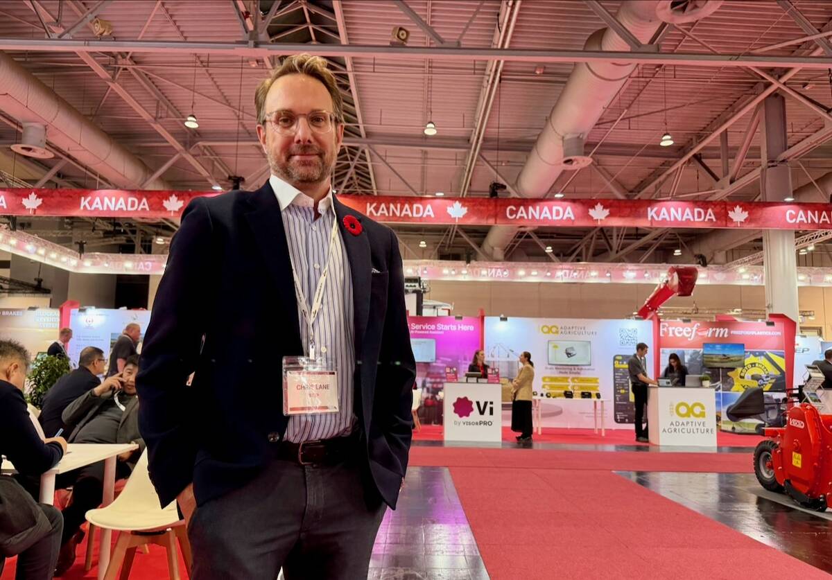 Chris Lane, president and CEO of the Saskatchewan Trade and Export Partnership, poses in front of the Canada Pavilion at Agritechnica 2025.