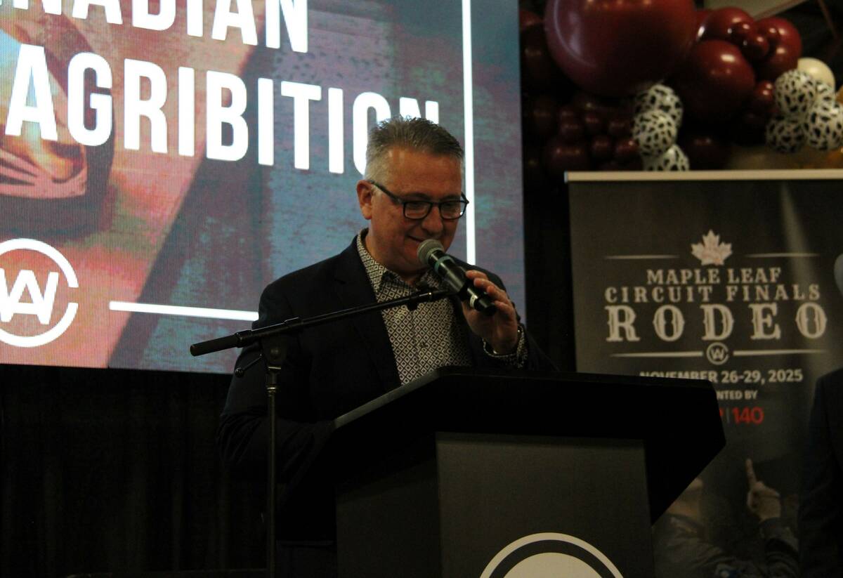 Federal agriculture minister Heath MacDonald speaks to attendees of the Burning of the Brand at his first ever Canadian Western Agribition.