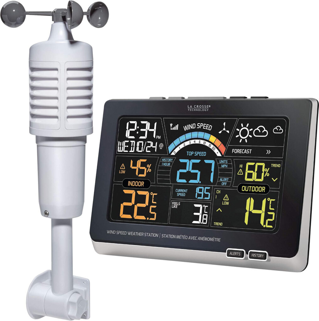 A screencap of a La Crosse weather station - including its outdoor temperature and wind sensor, and its indoor colour monitor.