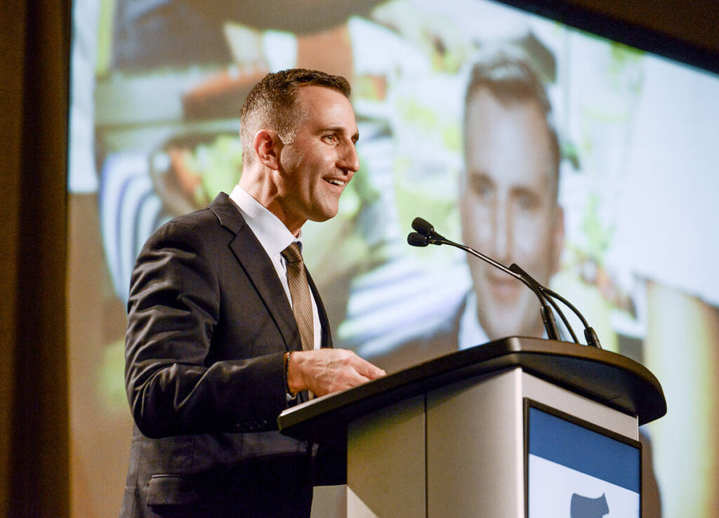 Trevor Jones, Ontario Minister of Agriculture, Food and Agri-business, announces an ag-focused omnibus bill he aims to bring to the legislature in April that will help streamline the beef cattle check-off and build resilience and competitiveness into the Ontario agricultural sector at the Beef Farmers of Ontario annual general meeting gala in Toronto on Feb. 18, 2026. Photo: Diana Martin