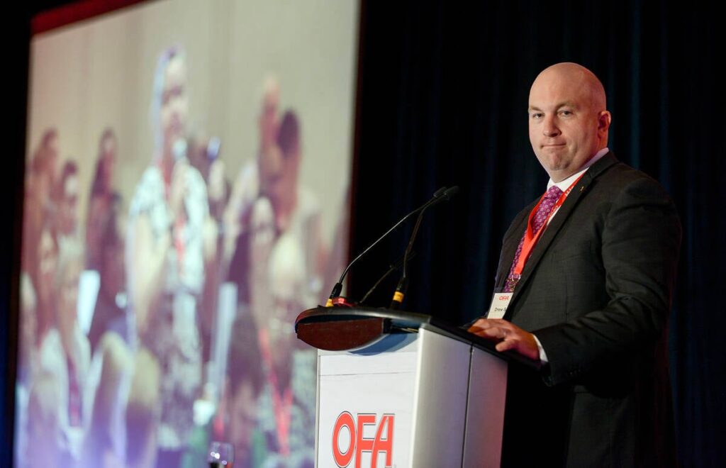 Drew Spoelstra, OFA president elected for a second term, mediated the debate on the last-minute amendment, asking for three mandatory in-person/hybrid meetings for the proposed Members