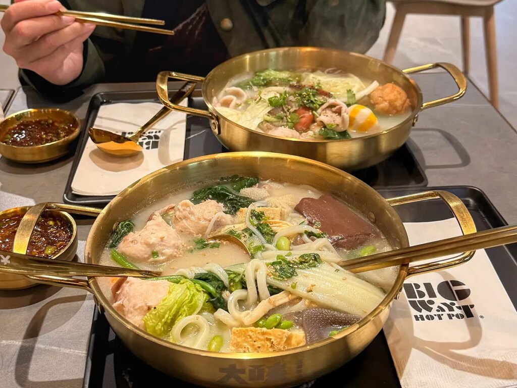 With hot pot, diners cook their own ingredients in a pot of simmering broth — usually shared at the table.