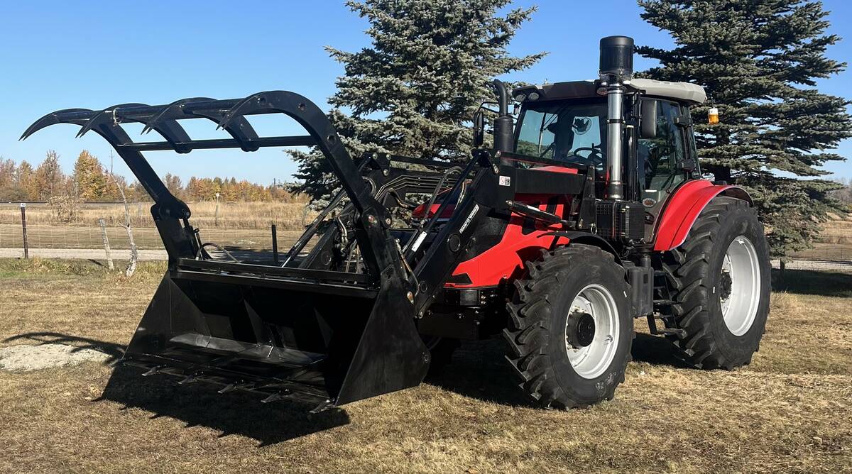 Ursa Ag 180 with front-end loader.