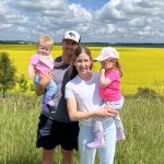 Olympic curler and Manitoba farm mom Kaitlyn Lawes, poses with her family in front of a canola field in full bloom.