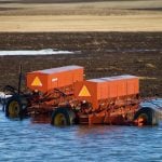 farm implements stuck in spring runoff