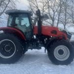Side view of an Ursa Ag 180 tractor.